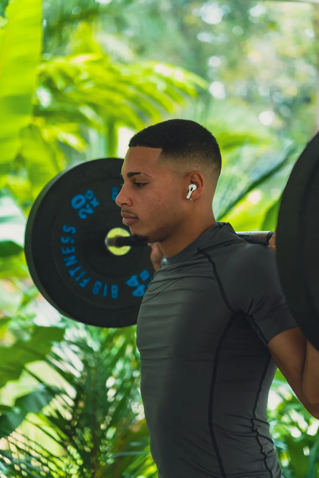 Man training with weights at the gym