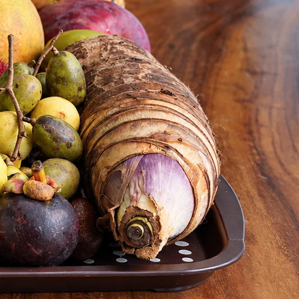 Taro root on a tray of tropical fruit in Puerto Viejo, Costa Rica